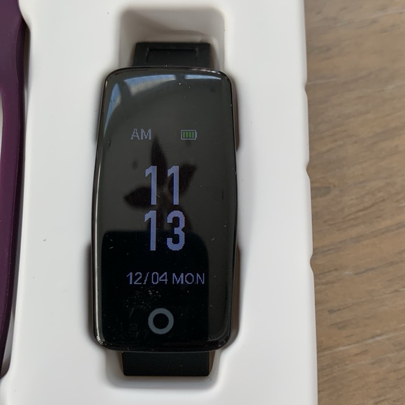 GRV Fitness Tracker with purple band, used for about 2 months. Works great. - Picture 2 of 4